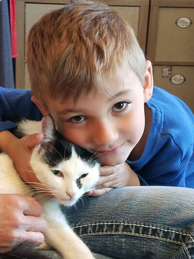 Our youngest volunteer snuggling with Rain