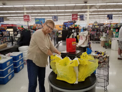 All smiles at Bagging for Tips @ Family Fare
