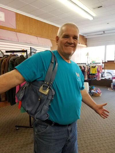 Being silly and modeling a purse for us @ our TRASH TO TREASURE sale