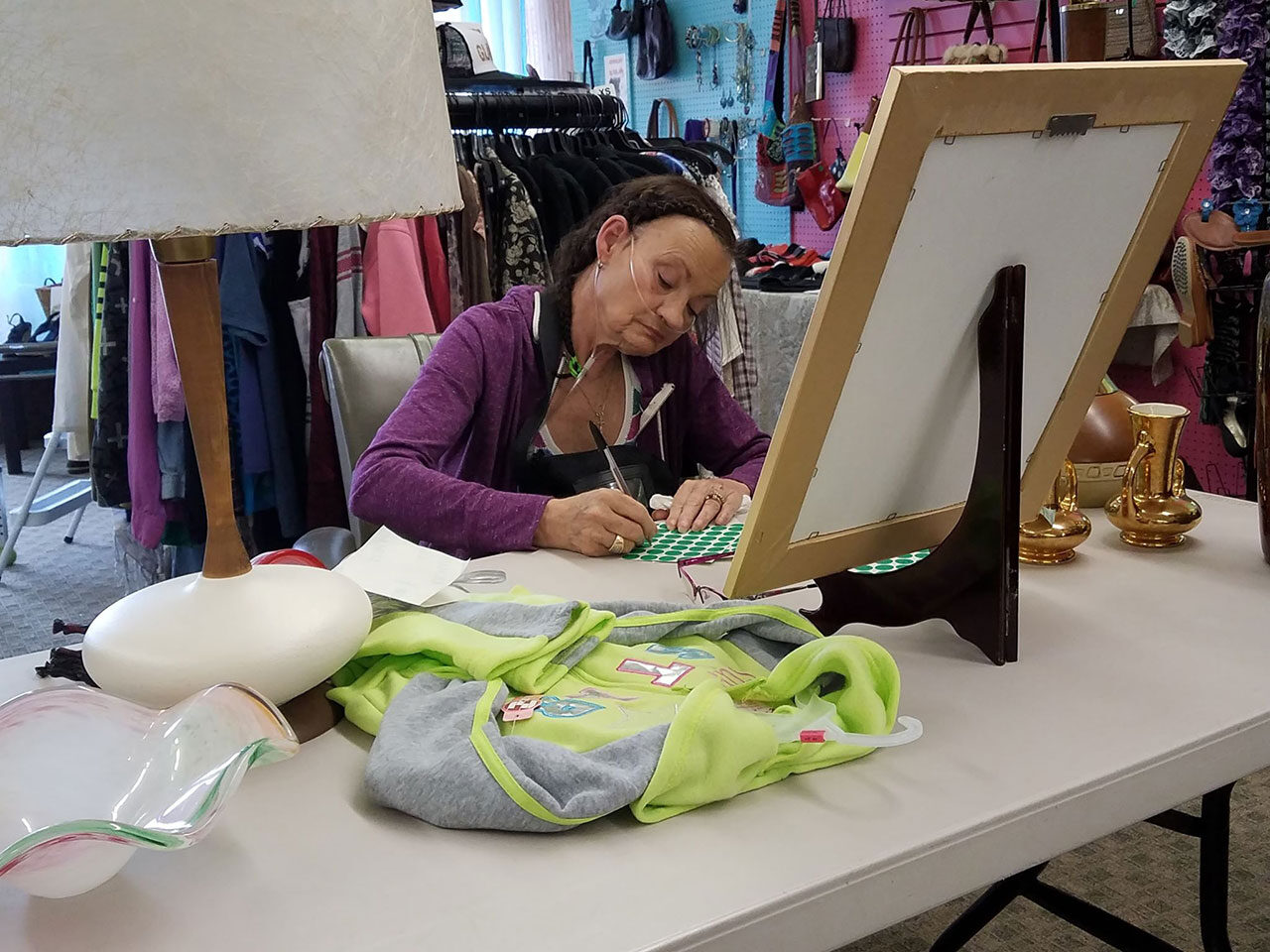 Helping at the TRASH TO TREASURE sale