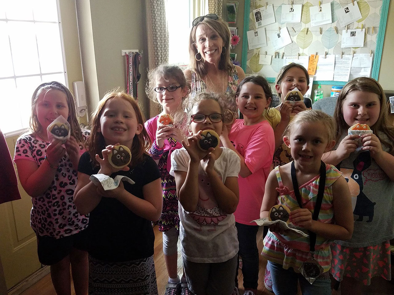 With the GIRL SCOUT troop that made us blankets and doggie treats